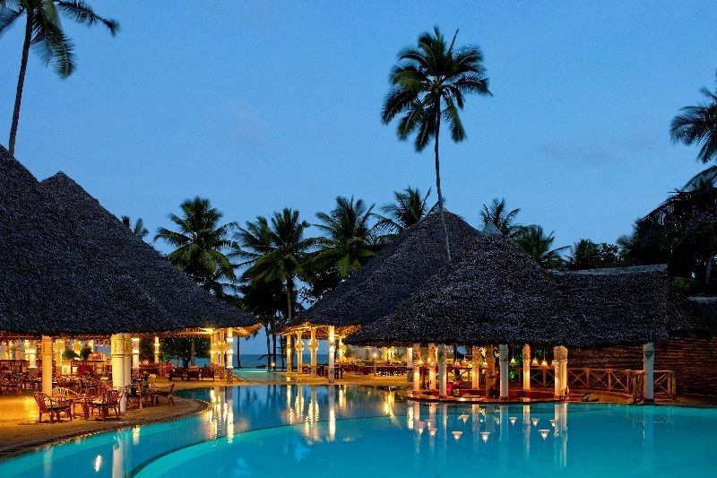 Village_Evening_View_of_Pool_and_Bars.jpg