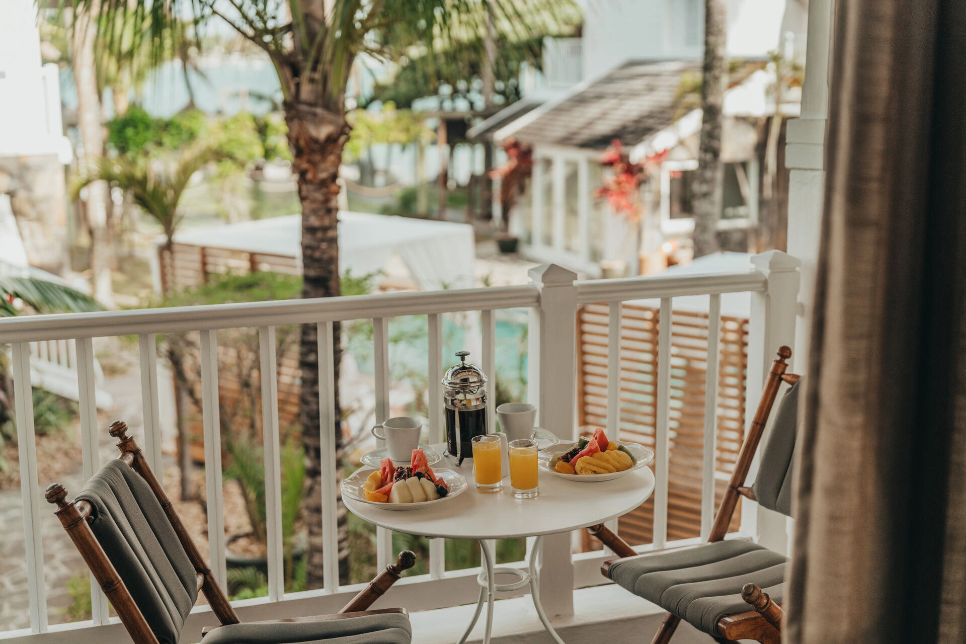 Charm_Rooms_-_Pool_view_breakfast.jpg